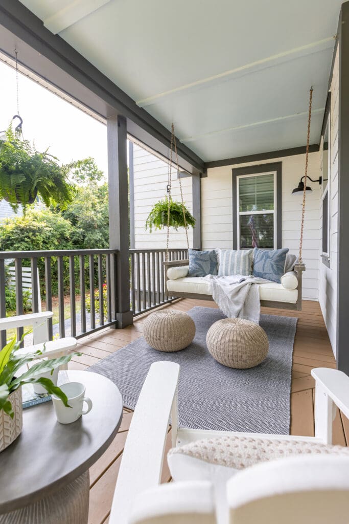 Southern porch swing design with breezy coastal textiles